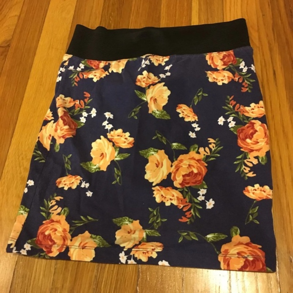 Blue skirt with flower designs🧜🏻‍♀️